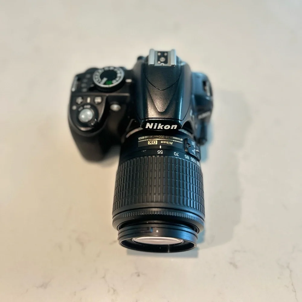 Nikon D3100 DSLR Camera with 55-200mm lens